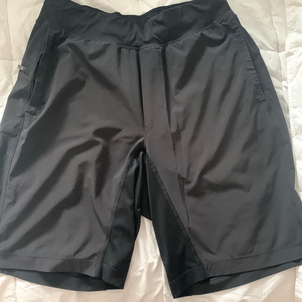 Mens. Small. T. H. E. Short. Linerless. 9 in.